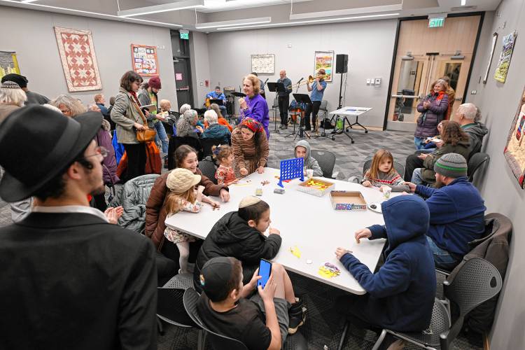 A Hanukkah potato pancake social was held at the Greenfield Public Library following the lighting of the menorah on the Greenfield Common on the sixth day of Hanukkah on Monday evening.