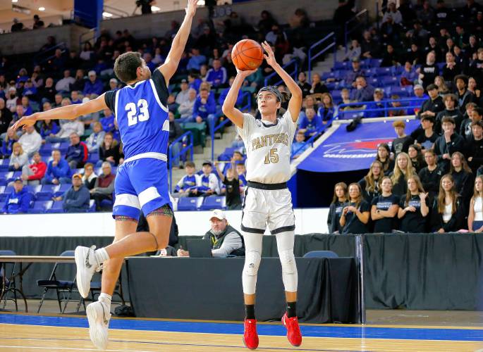 Pioneer’s Alex McClelland (15) takes a shot defended by Hopedale’s Nate Rutkowski (23) in the second quarter of the MIAA Div. 5 state championship Saturday at the Tsongas Center in Lowell. Pioneer’s Alex McClelland (15) takes a shot defended by Hopedale’s Nate Rutkowski (23) in the second quarter of the MIAA Div. 5 state championship Saturday at the Tsongas Center in Lowell.
