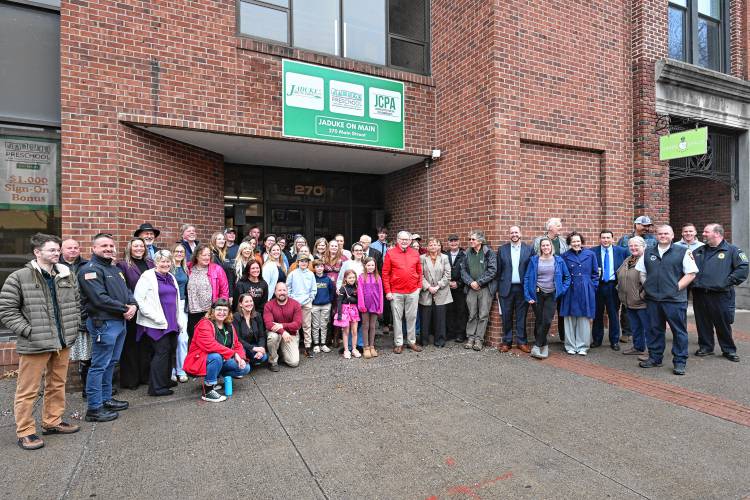 A group photo following Thursday’s ribbon cutting for Ja’Duke on Main at 270 Main St. in Greenfield.