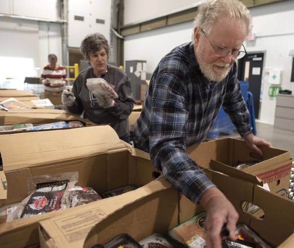 Volunteers at the Food Bank of Western Massachusetts in January. Volunteers at the Food Bank of Western Massachusetts in January.