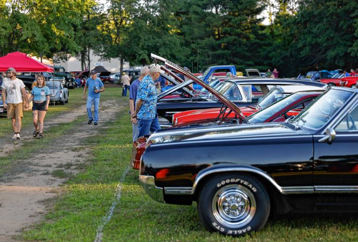 Attendees check out the 151 antique vehicles gathered for the weekly Friday Cruise Night at Tom’s Long Hot Dogs in Whately. The show takes place every Friday night, from 5 p.m. until dusk, through Sept. 6, weather permitting. There are no rain dates. Tom’s is located at 61 State Road.