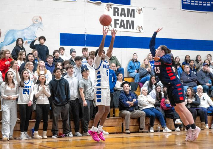 Granby's Gavier Fernandez (5) attempts a three-point shot during the PVIAC Class C tournament semifinal game against Mahar at Granby High School, Tuesday, Feb. 18, 2025, in Granby.