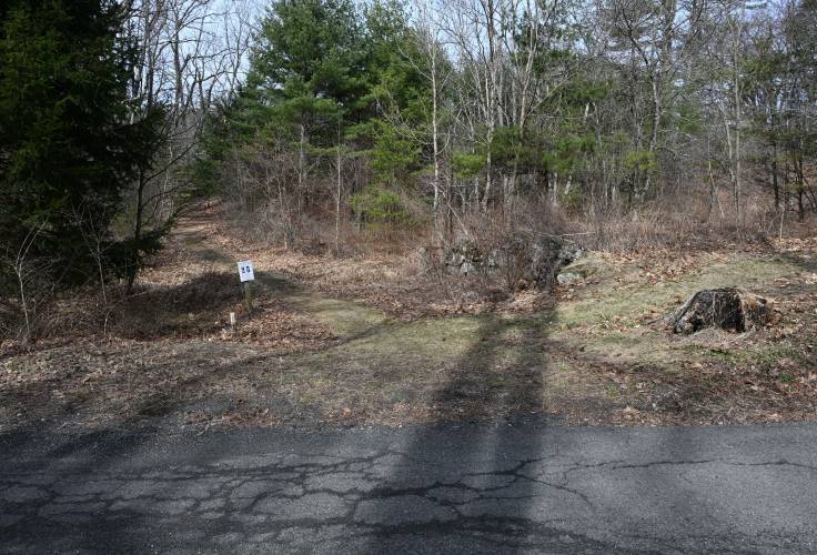 The access point to land bordering Reeds Bridge Road and the South River in Conway, with a parking area across the street, that is protected by the Franklin Land Trust.
