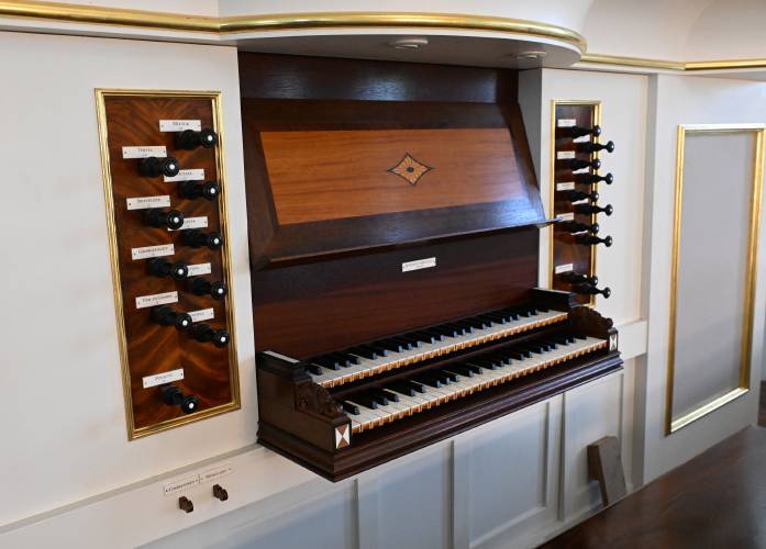 Stefan Maier has worked on this Richards & Fowkes pipe organ in the First Church of Deerfield.