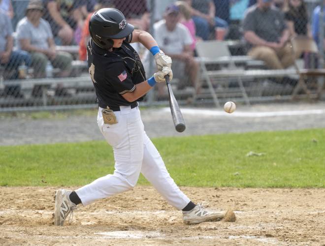 Pioneer's Brody Welcome hits the ball during the PVIAC Class D championship game against Hopkins Academy at Mackenzie Stadium, Wednesday, May 28, 2025, in Holyoke.