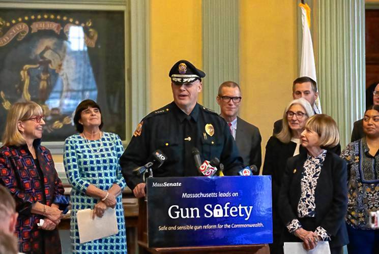 Agawam Police Chief Eric Gillis, president of the Massachusetts Chiefs of Police Association, lends his support to the Senate version of gun reform legislation during a press conference on Jan. 25. Agawam Police Chief Eric Gillis, president of the Massachusetts Chiefs of Police Association, lends his support to the Senate version of gun reform legislation during a press conference on Jan. 25.