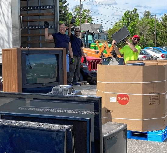 Staff sort appliances at a previous “Clean Sweep” Bulky Waste Recycling Day