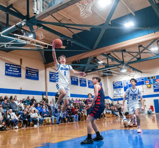 Granby's Riley Goodhind (1) attempts a layup during the PVIAC Class C tournament semifinal game against Mahar at Granby High School, Tuesday, Feb. 18, 2025, in Granby.