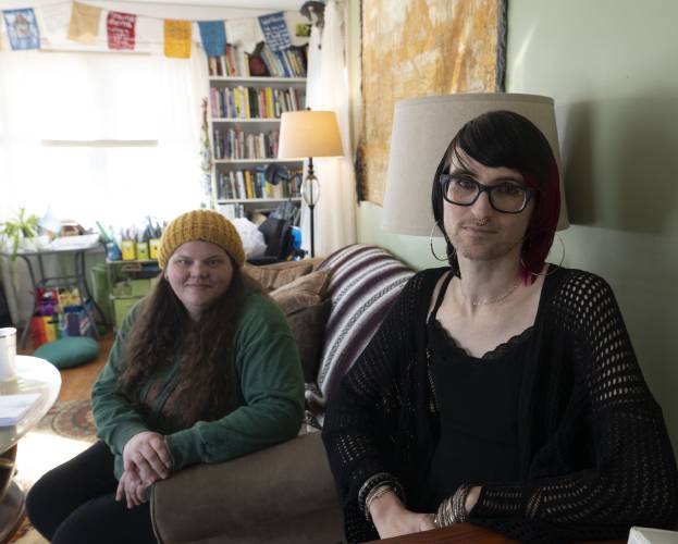 Tásha Pearce, a virtual peer specialist and community bridger, and Ephraim Akiva, the senior director of peer respite with Wildflower Alliance in the Afiya house in Northampton. 