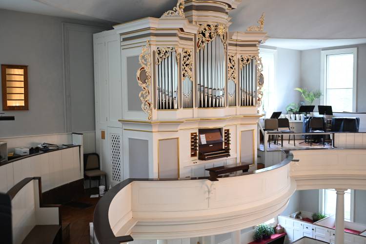 Stefan Maier has worked on this Richards & Fowkes pipe organ in the First Church of Deerfield.