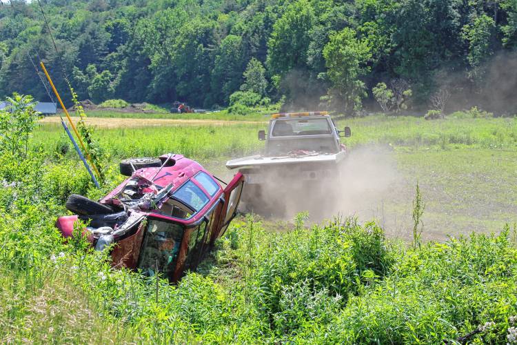 A woman in her 60s was taken to Cooley Dickinson Hospital with non-life-threatening injuries following a rollover crash on Route 112 in Buckland on Wednesday afternoon.