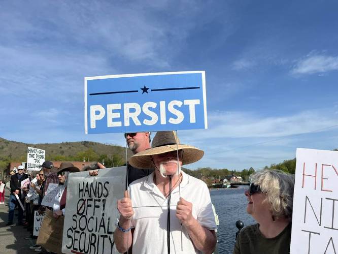 A May Day gathering in Shelburne Falls on the Iron Bridge on Thursday.