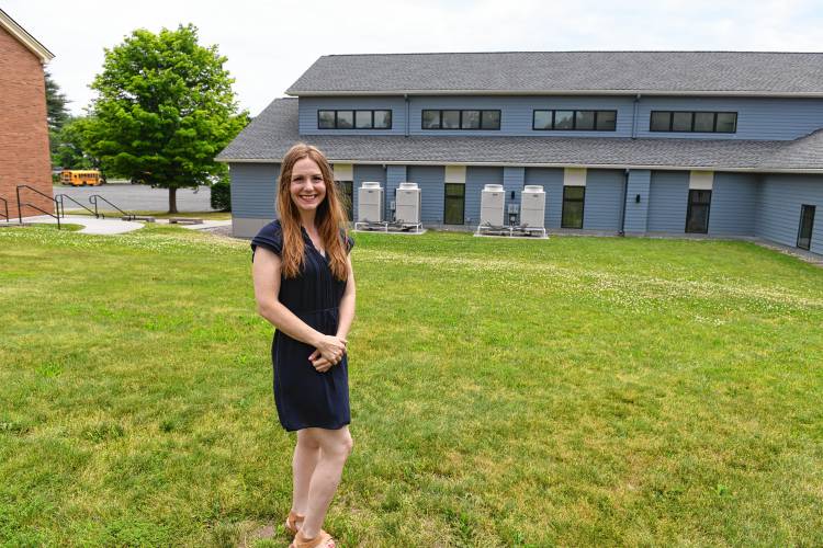 Preschool Director Catherine-Anne Cuff stands where a playground may be built for the new Beacon of Light Preschool at 14 Beacon St. that will open in September.