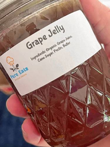 Evan Holloway makes grape jelly that will be for sale at the Warwick Children’s Business Fair on Saturday, April 6.