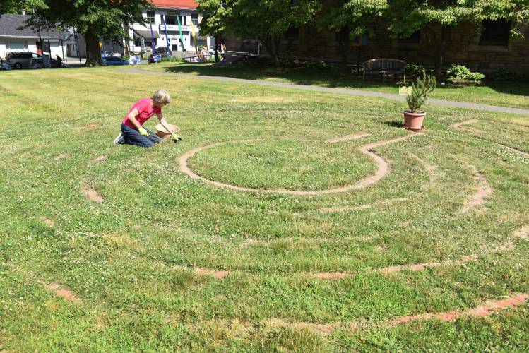 Greenfield resident Maggie Sweeney is seen here starting to weed the labyrinth at the Episcopal Church of Saints James and Andrew in Greenfield in May 2022. In recognition of World Labyrinth Day, the Friends of the Community Labyrinth will hold a “Walk as One” event at this labyrinth on Saturday at 1 p.m. Greenfield resident Maggie Sweeney is seen here starting to weed the labyrinth at the Episcopal Church of Saints James and Andrew in Greenfield in May 2022. In recognition of World Labyrinth Day, the Friends of the Community Labyrinth will hold a “Walk as One” event at this labyrinth on Saturday at 1 p.m.