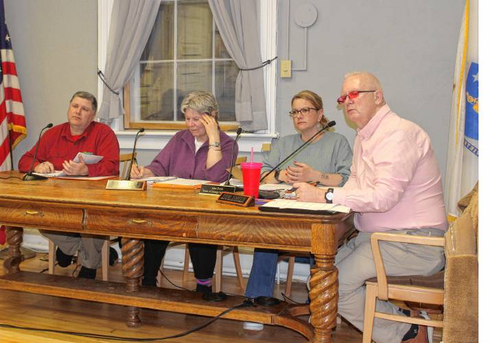 From left, Orange Selectboard member Mike Bates, member Jane Peirce, Vice Chair Julie Davis and Chair Tom Smith listen to an attendee speak at last week’s meeting in Orange Town Hall. From left, Orange Selectboard member Mike Bates, member Jane Peirce, Vice Chair Julie Davis and Chair Tom Smith listen to an attendee speak at last week’s meeting in Orange Town Hall.