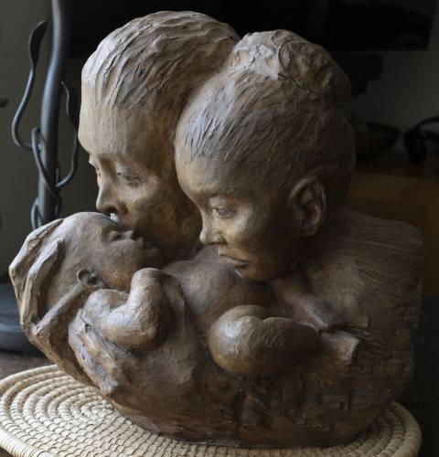 Life, and the outpouring of love, as artist Peg Holcomb describes it, also takes other forms in her “The Love Series” sculptures, with works titled “Beginnings” and “The Blessing.” They will be included in the first exhibit of her work, at Munson Memorial Library in Amherst on Saturday, April 26.