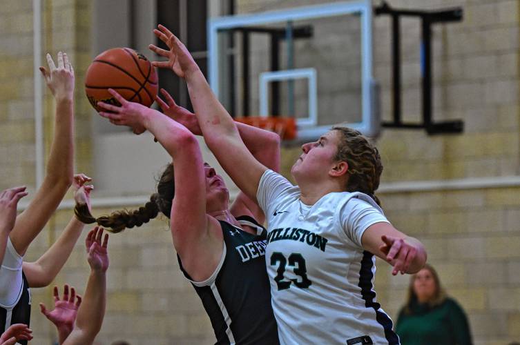 Williston’s Skyler Walker (23) tries to block a shot from Deerfield Academy’s Charlotte Coody during NEPSAC action in Deerfield on Wednesday.