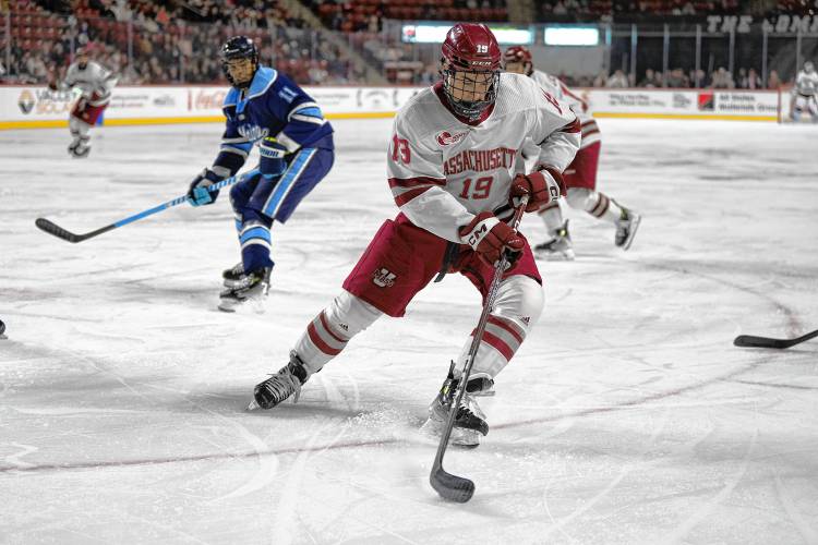UMass forward Cole O’Hara (19) holds possession of the puck against Maine last weekend at the Mullins Center in Amherst. The Minutemen will play UConn in a home-and-home series this weekend. UMass forward Cole O’Hara (19) holds possession of the puck against Maine last weekend at the Mullins Center in Amherst. The Minutemen will play UConn in a home-and-home series this weekend.