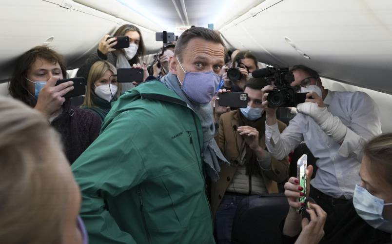 Alexei Navalny is surrounded by journalists inside a plane carrying him back to Russia from the airport near Berlin, Germany, on Sunday, Jan. 17, 2021. Navalny, who was President Vladimir Putin’s fiercest political foe, died in a Russian prison on Feb. 16, 2024. Alexei Navalny is surrounded by journalists inside a plane carrying him back to Russia from the airport near Berlin, Germany, on Sunday, Jan. 17, 2021. Navalny, who was President Vladimir Putin’s fiercest political foe, died in a Russian prison on Feb. 16, 2024.