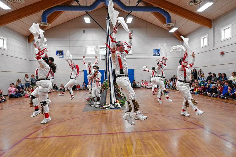 Dancers with Marlboro Morris M dance around the maypole at Conway Grammar School in celebration of May Day on Wednesday.