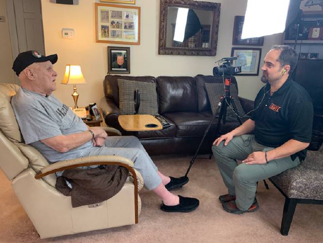 Keith Sherman, right, interviews Raymond Harris, the father of Marine Capt. Jennifer Harris, who died in a helicopter crash while serving in Iraq in 2007, during a cross-country trip to interview at least one Gold Star family in each state in 2019. Legislation drafted by Sherman, a Heath native, with the intent of recognizing those killed serving in the U.S. military has been introduced in both chambers of Congress.