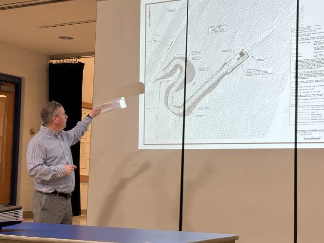 Matthew Tilden with Dewberry Engineering explains the plans for constructing a cell tower on Call Road in Colrain during a meeting Wednesday.