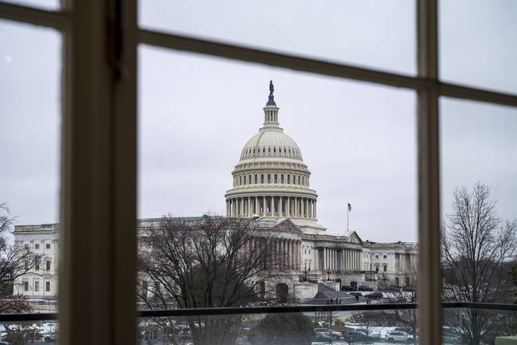 The Capitol is seen framed through a window in the Cannon House Office Building on Capitol Hill in Washington, Thursday, Feb. 13, 2025. The Capitol is seen framed through a window in the Cannon House Office Building on Capitol Hill in Washington, Thursday, Feb. 13, 2025.
