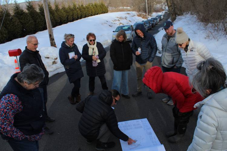 Berkshire Design Group Landscape Architect Carlos Nieto lays out the plans for the Friends of the Franklin County Sheriff’s Office Regional Dog Shelter’s potential new building on Plain Road East in Deerfield during a site visit in February. The Zoning Board of Appeals’ public hearing on the project will continue on May 15. Berkshire Design Group Landscape Architect Carlos Nieto lays out the plans for the Friends of the Franklin County Sheriff’s Office Regional Dog Shelter’s potential new building on Plain Road East in Deerfield during a site visit in February. The Zoning Board of Appeals’ public hearing on the project will continue on May 15.