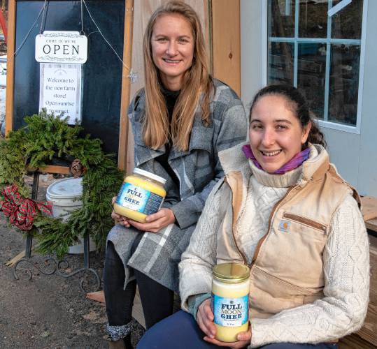April Poirier, owner of Full Moon Ghee with Hannah Jacobson-Hardy, founder, at the Sweet Birch Herbals farm stand in Ashfield.