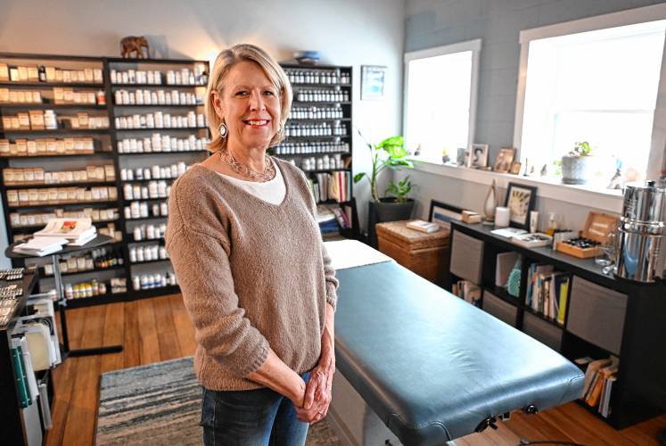 Kristine Jelstrup of Shelburne Falls Natural Healing in her office on State Street.