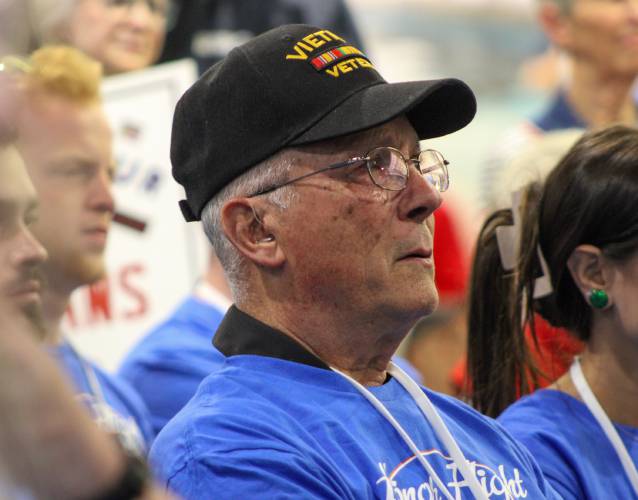 Greenfield native and Vietnam War veteran William Phelps sits teary-eyed during a send-off ceremony for him and 64 other veterans of World War II, the Korean War and the Vietnam War as they prepare to travel to Washington D.C. through Honor Flight Connecticut at Bradley International Airport on Saturday, May 3.