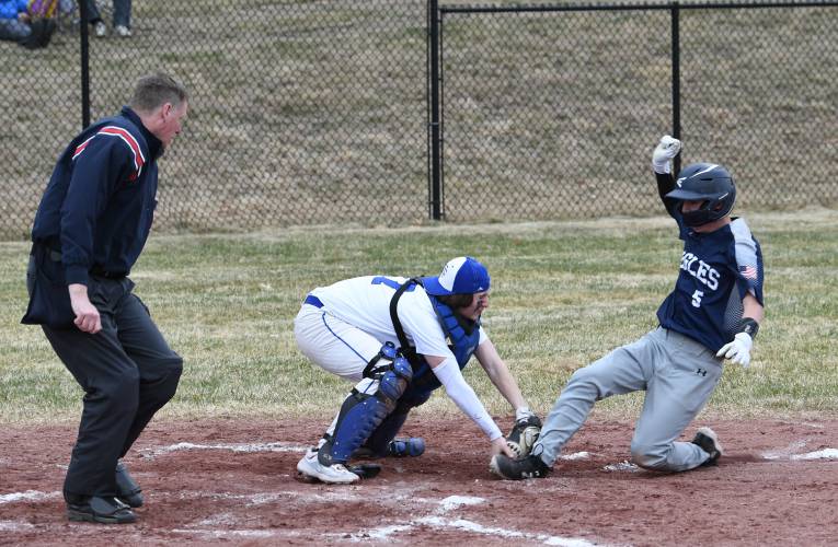 Turners Falls catcher Kainen Stevens tags out Franklin Tech’s William Ainsworth at home at the Bourdeau Fields Complex in Turners Falls earlier this season. Turners Falls catcher Kainen Stevens tags out Franklin Tech’s William Ainsworth at home at the Bourdeau Fields Complex in Turners Falls earlier this season.