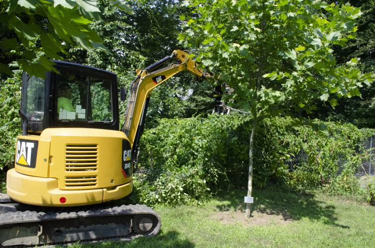 Dylan Saladino of Saladino Property Maintenance removes temporary fencing at the Franklin County Fairgrounds in Greenfield. The fairgrounds is working to improve security around the perimeter of the property using $56,775 in grant funding.