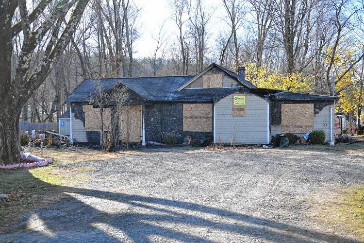 A fire ravaged a single-story house at 52 Silver St. in Greenfield, kil late Wednesday night.