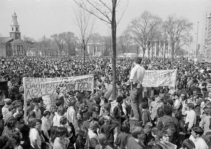 Members of Students for a Democratic Society stage demonstrations New Haven Green near area where huge rally was being held by Black Panthers and supporters, May 1, 1970. Panthers were protesting the jailing of eight of their group in New Haven. Members of Students for a Democratic Society stage demonstrations New Haven Green near area where huge rally was being held by Black Panthers and supporters, May 1, 1970. Panthers were protesting the jailing of eight of their group in New Haven.
