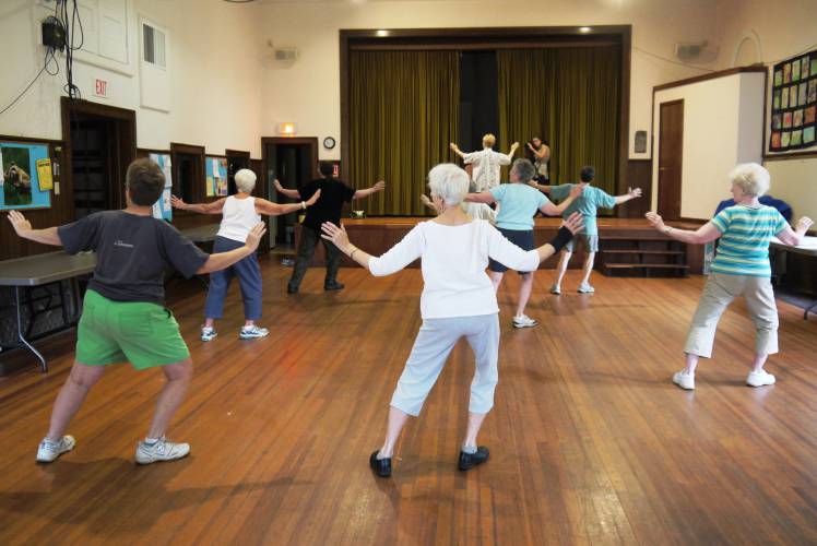 Elderly residents participate in a tai chi class under LifePath’s Healthy Living Program. Amid anticipated cuts to federal Older Americans Act (Title III) funding, LifePath is stopping its Healthy Living Program, which assists those facing long-term health challenges.