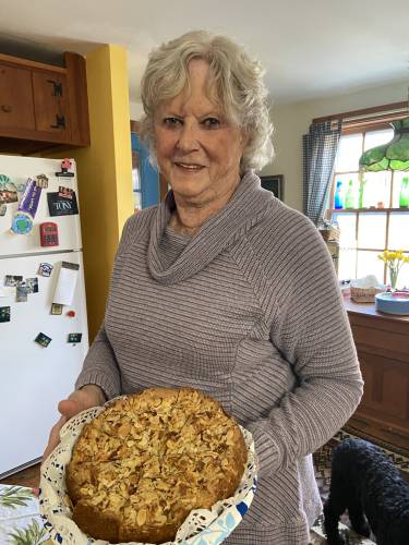 Lorraine “Rainey” McCarthy with her almond torte at the Sons and Daughters of Hawley’s annual Mud Party a few weeks ago.