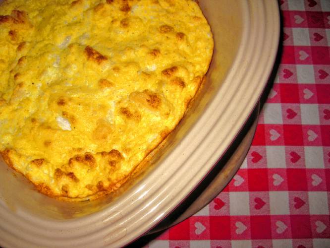 This egg dish isn’t in the current edition of ‘The Fannie Farmer Cookbook,’ but it appeared in the one with which I grew up. I think it was called American Cheese Fondue.