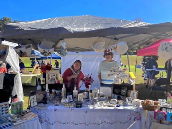 Artist Tricia Vinchesi and her lifelong friend Cindy Voorhis at the Festival of the Hills on Sunday. 