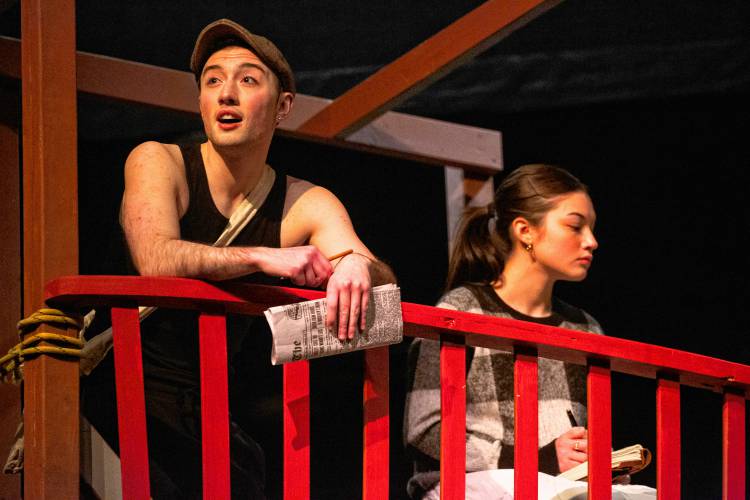 Greyson Lynch, left, and Emma Yee take part in a tech rehearsal of Amherst Community Theater’s production of “Newsies” at the University of Massachuestts Amherst’s Bowker Auditorium.