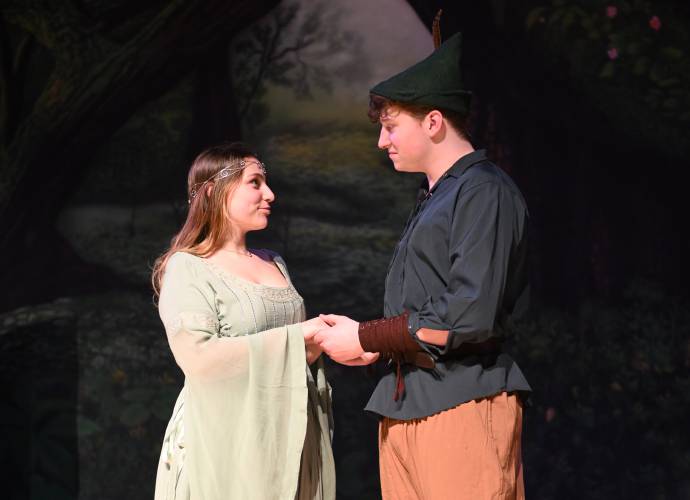 April Rooney Adams as Maid Marian and Camden Toponce as Robin Hood during rehearsal for Greenfield High School’s production of “The Somewhat True Tale of Robin Hood.”