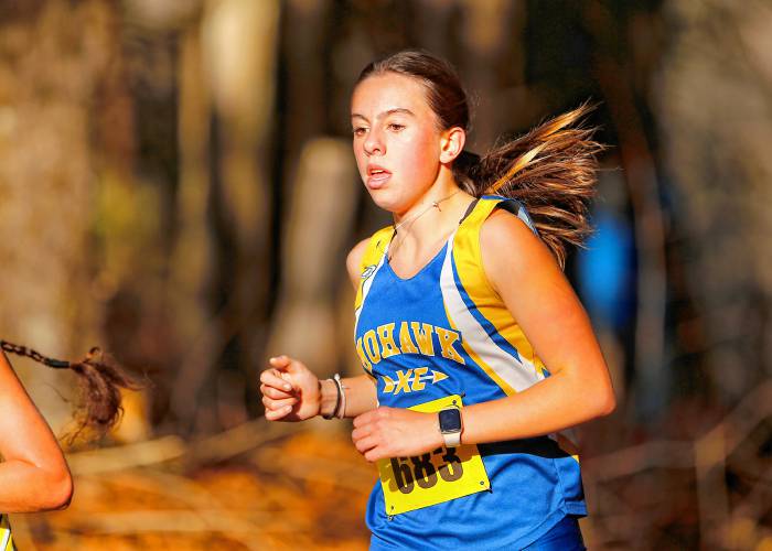 Mohawk Trail’s Virginia Krezmien, shown here during cross country season, set a new program record for most points scored during an indoor track season on Sunday at Smith College in Northampton.