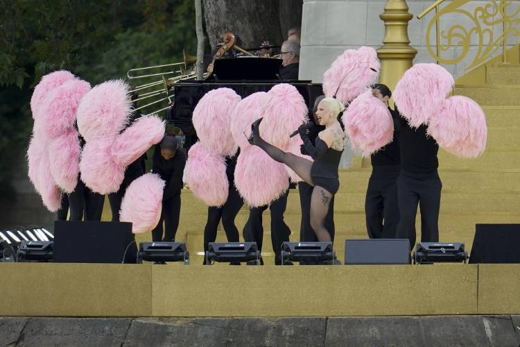 Lady Gaga performs in Paris, France, ahead the opening ceremony of the 2024 Summer Olympics, Friday, July 26, 2024. (AP Photo/Kin Cheung)