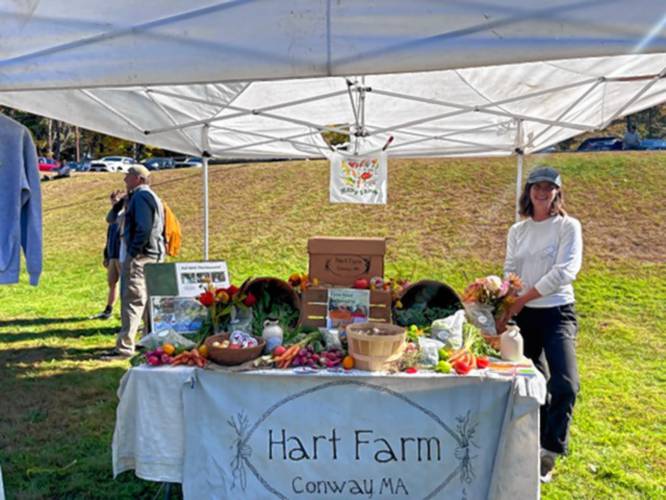 Anna Meyer at Hart Farm's booth at the Festival of the Hills in Conway.