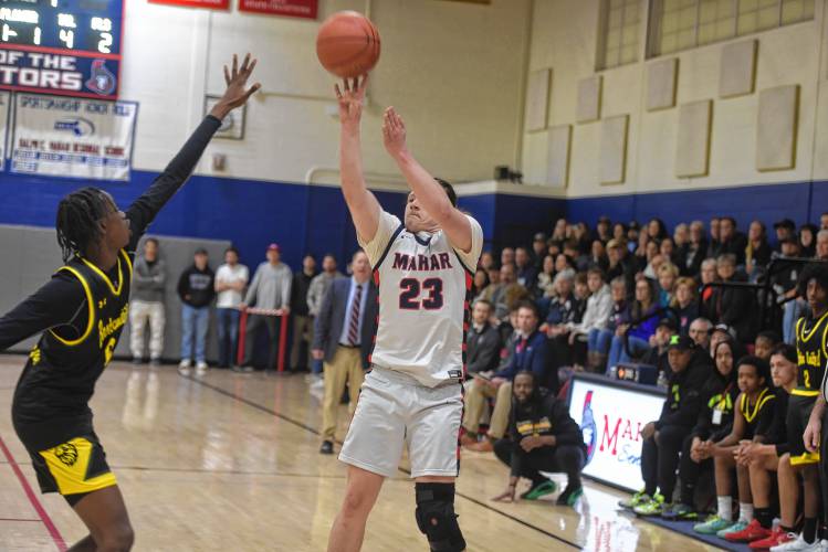 Mahar's Derek Collins takes a 3-pointer against Boston International during an MIAA Div. 5 Round of 32 contest in Orange on Friday. 