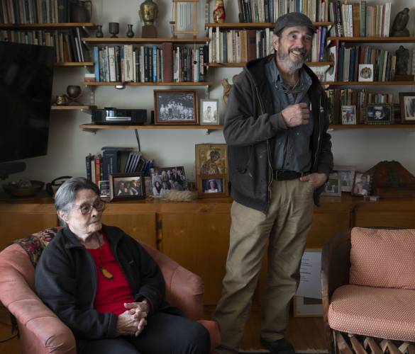 Peg Holcomb with her son, Tim Holcomb, who, along with support from his three other siblings, encouraged his mom to exhibit her artwork.