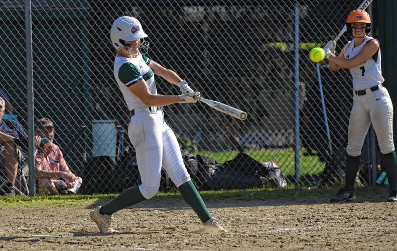 Greenfield’s MacKenzie Paulin (5) drives a double into the gap during the third inning of the Green Wave’s 12-0 victory over Monson in the MIAA Division 5 Round of 16 on Wednesday at Veterans Field in Greenfield.