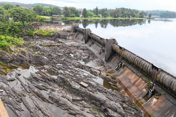 Water from a previous high water flow forms small pools below the Turners Falls dam on Wednesday evening.