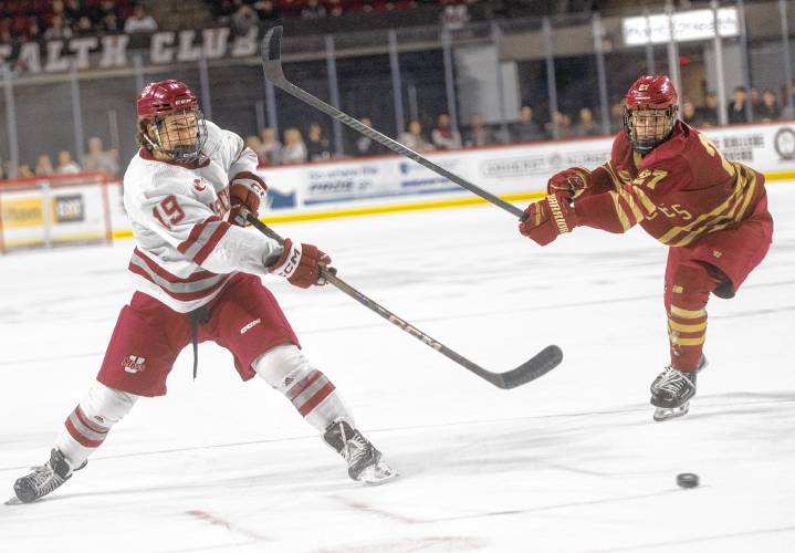 UMass right wing Cole O’Hara (19) attempts a shot past Boston College forward Connor Joyce (27) at the Mullins Center, Saturday, Feb. 15, 2025, in Amherst.